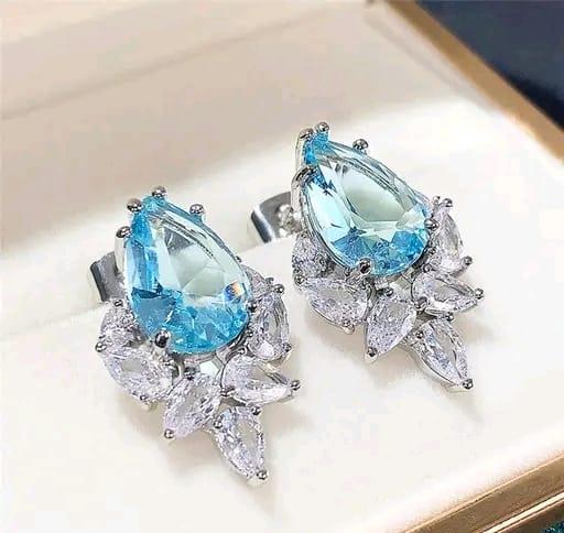 Jewels Galaxy Silver-Plated American Diamond Blue Crushed Ice Drop Earrings