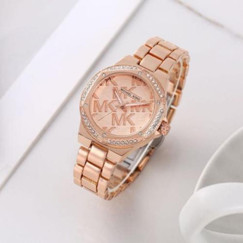 Michael Kors Womens Collection .