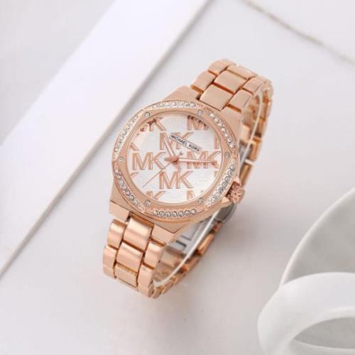Michael Kors Womens Collection .