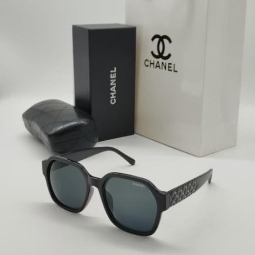 CHANEL SUNGLASSES .